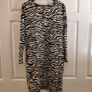 Sassy animal print rouched back zip dress